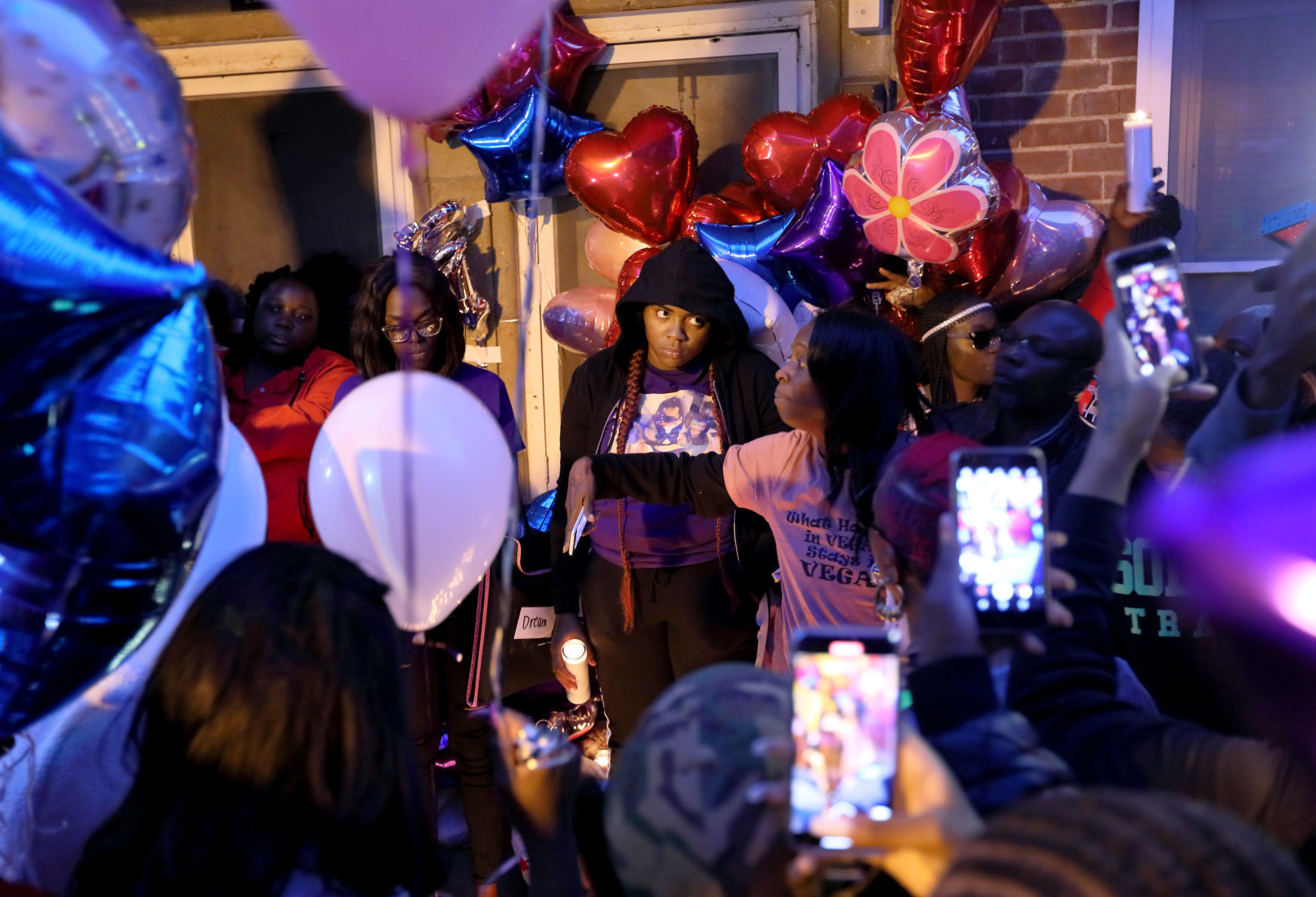 Vigil for three children killed in fire